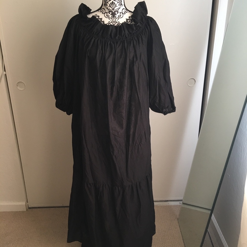 Black maxi dress with flounce at bottom